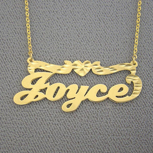 Custom 10k solid yellow gold script nameplate necklace spelling Joyce with top accent line and center heart detail.
