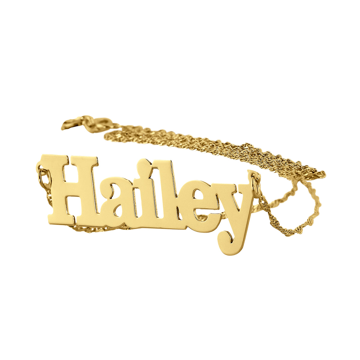 Close-up detail of 10k yellow gold Singapore chain attached to custom block font nameplate.