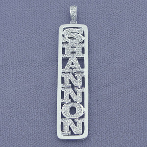 Solid gold vertical custom name pendant necklace set with sparkling white diamonds
