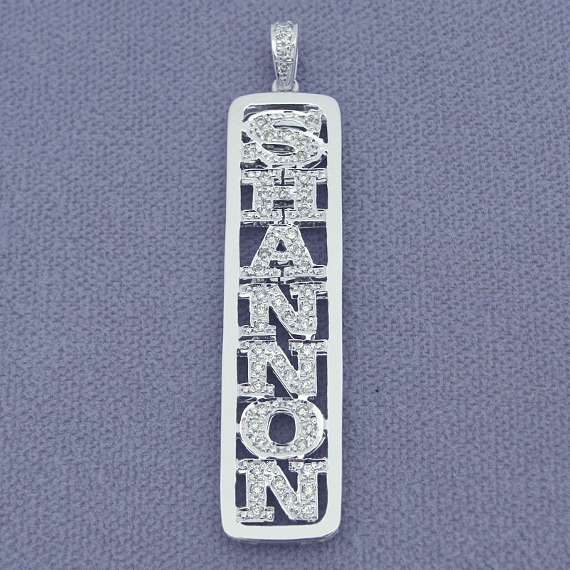 Solid gold vertical custom name pendant necklace set with sparkling white diamonds