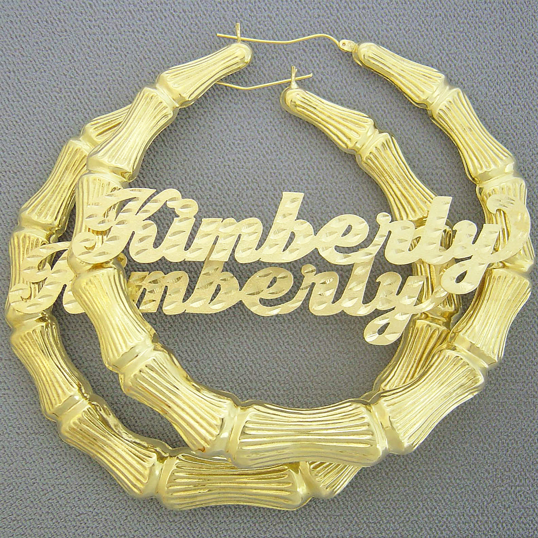 Custom 10K real gold extra large bamboo name hoop earrings featuring personalized diamond-cut nameplates
