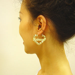 1.5 inch gold heart bamboo nameplate hoop earrings worn on ear