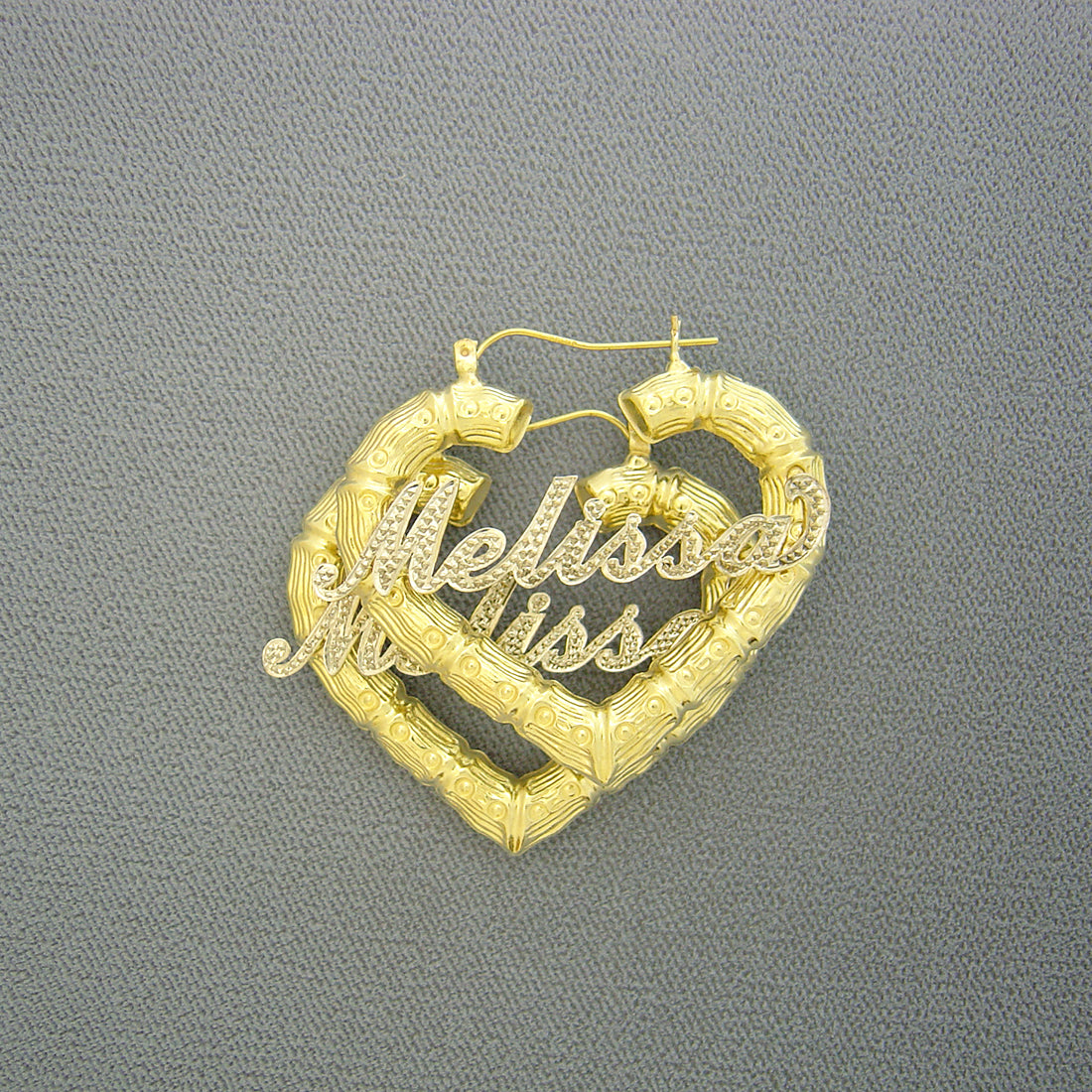 Solid 10k two-tone gold personalized iced out heart bamboo earrings with cursive nameplate