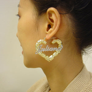 10K gold two-tone iced out heart bamboo name earrings (2.18 inch) worn on model