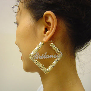 Model wearing 2.75 inch personalized 10k gold square door knocker bamboo hoop earrings