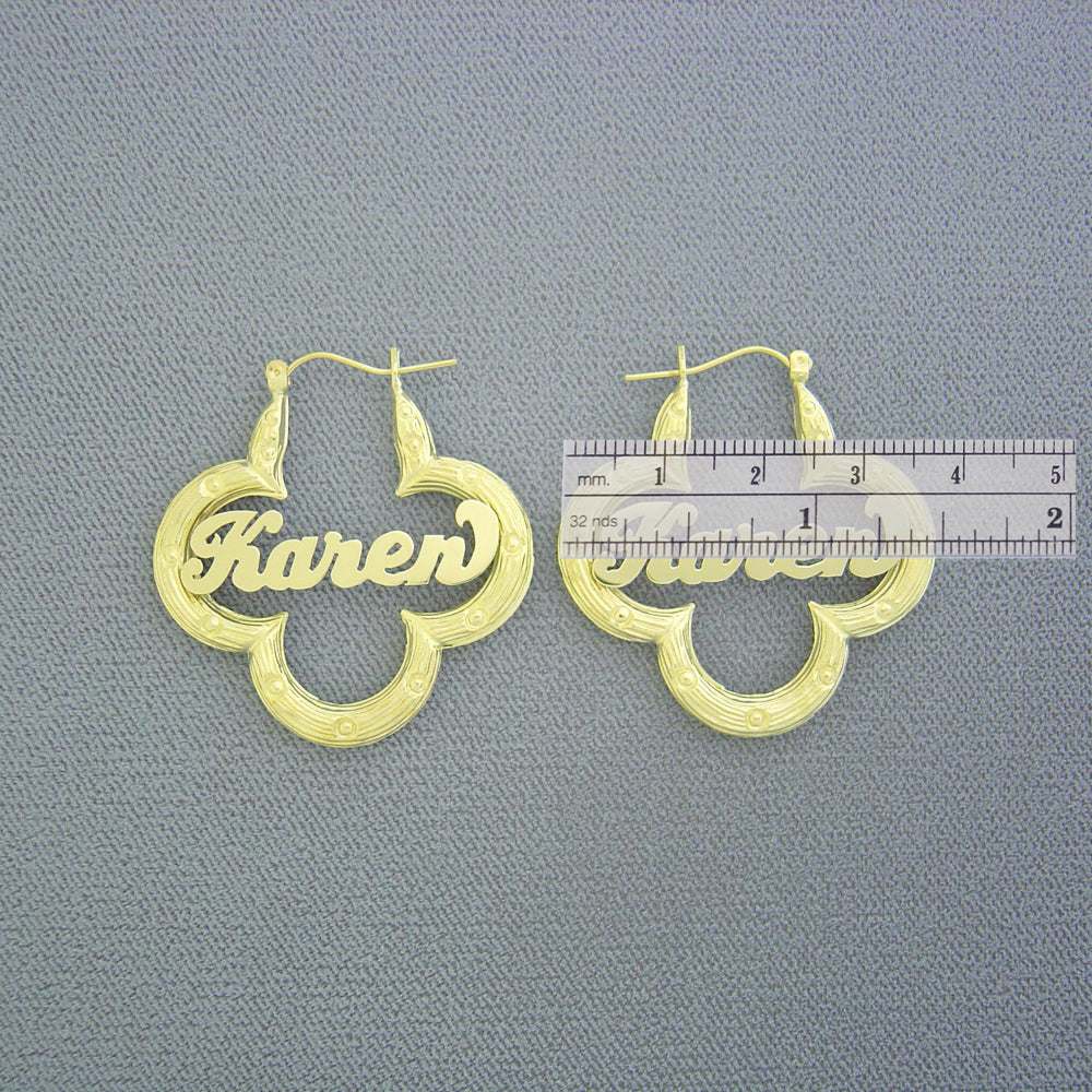Side view detail of 10K real gold flower bamboo name earring with hinged hoop closure