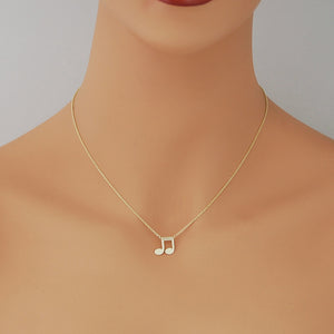 mannequin wearing personalized solid gold music note pendant necklace