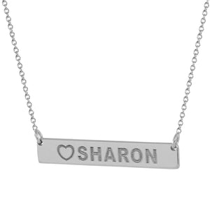Close-up of solid white gold personalized heart name bar pendant