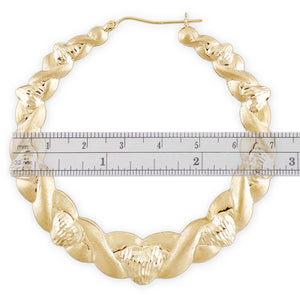 Hinged snap clip closure on 10K real gold 2.75 inch puffed heart hoop earring
