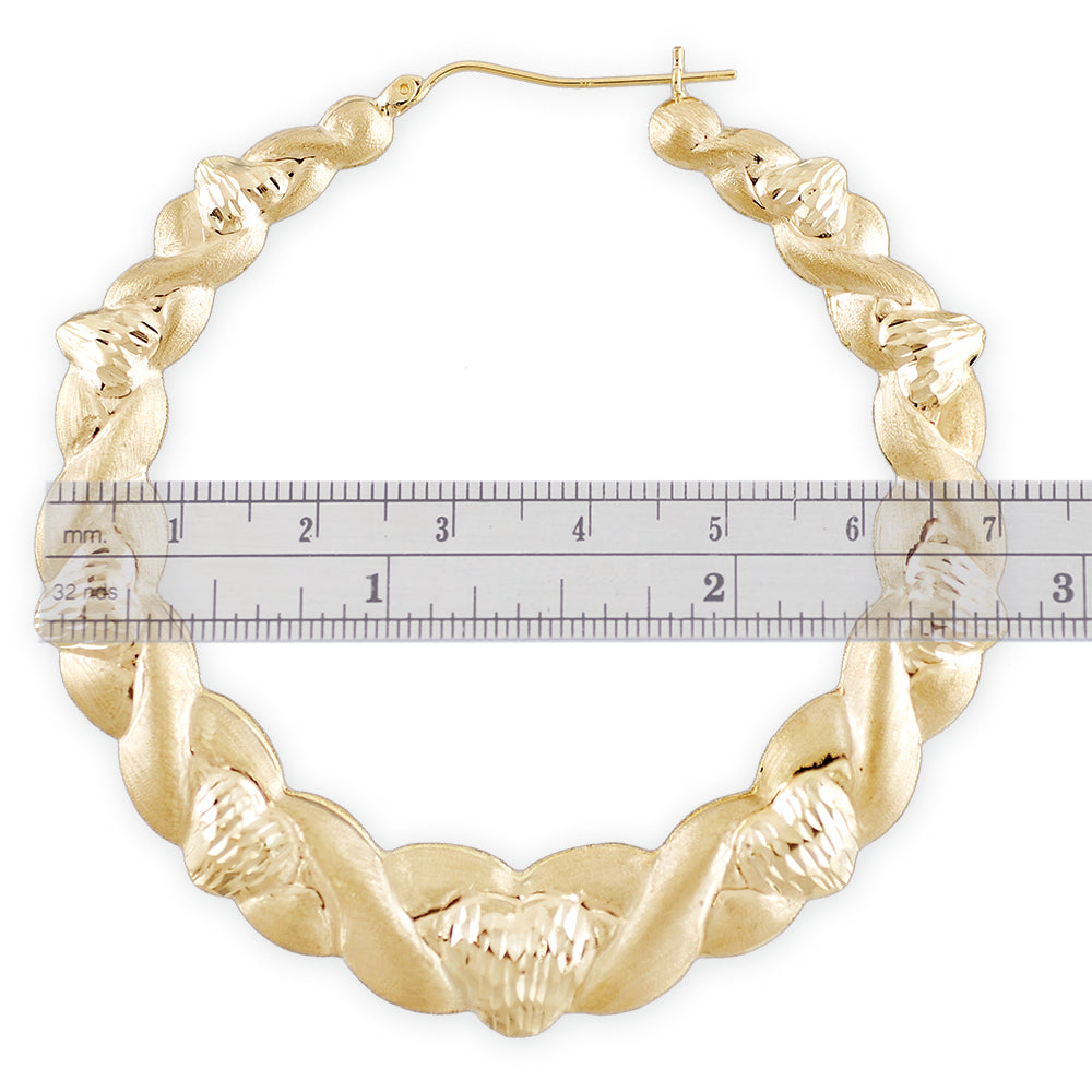 Hinged snap clip closure on 10K real gold 2.75 inch puffed heart hoop earring
