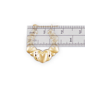 Hinged snap hoop closure on 10K gold XO heart door knocker earring