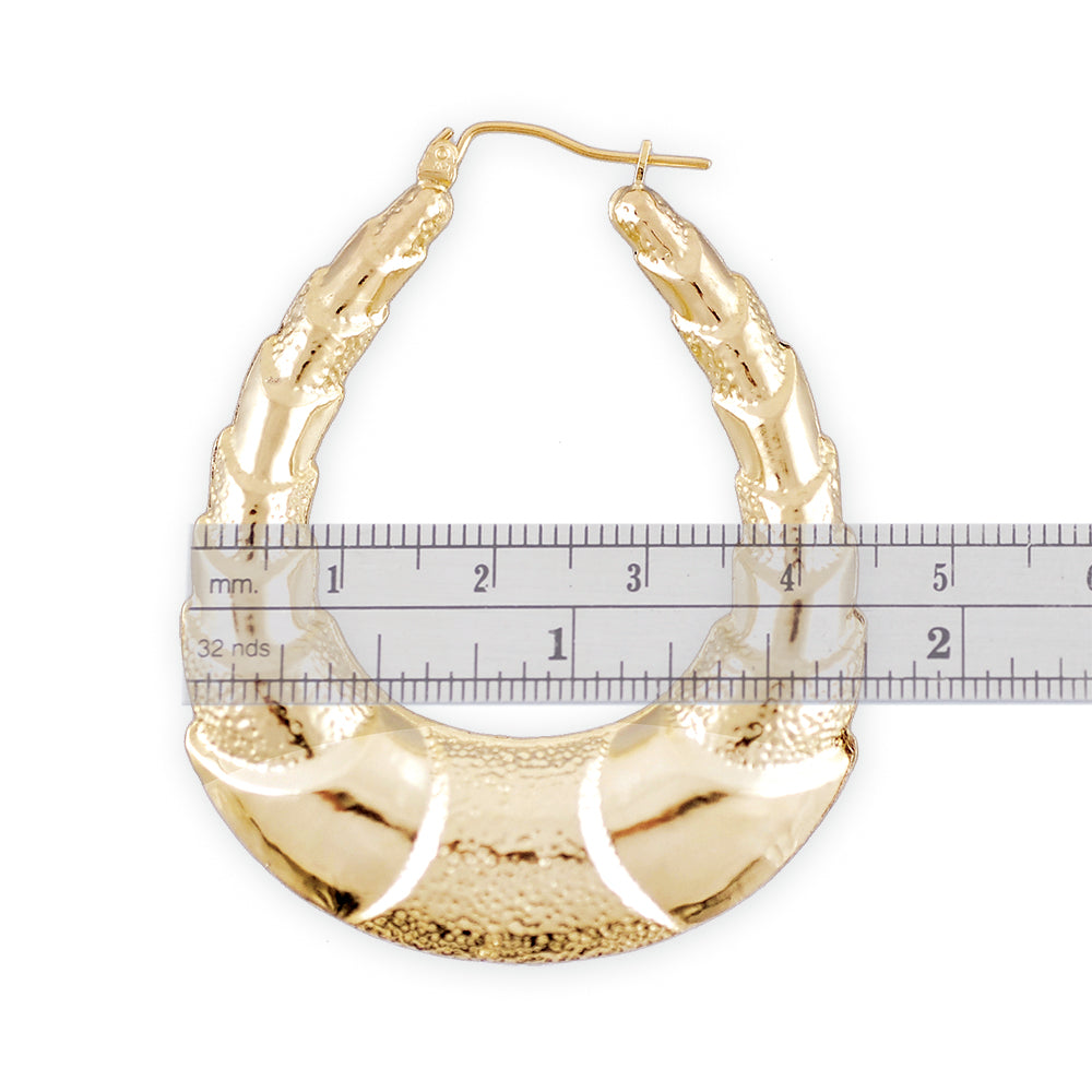 Hinged snap closure on 10k gold shrimp door knocker oval hoop earrings
