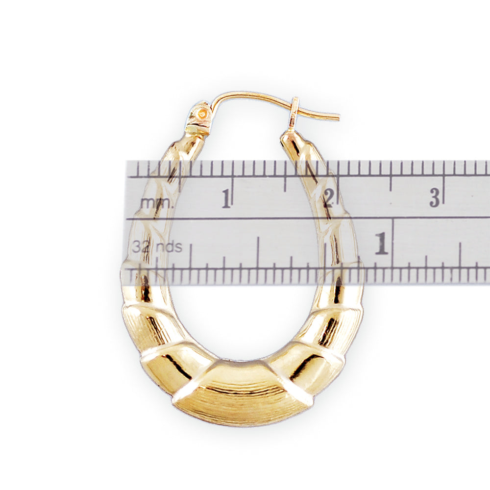 Close-up of 10K gold shrimp door knocker earring showing hinged snap hoop closure