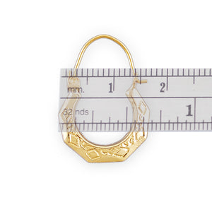 10k yellow gold baby doorknocker earrings measured on a ruler showing 5/8 inch width