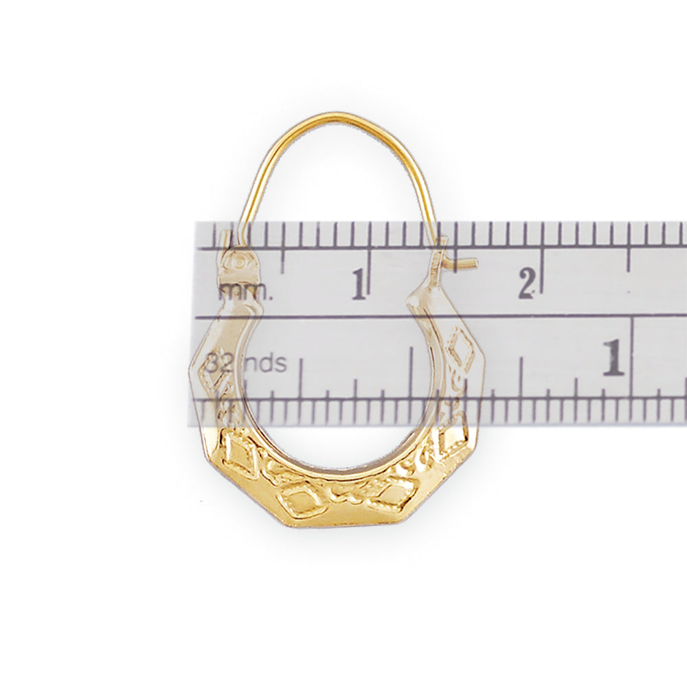 10k yellow gold baby doorknocker earrings measured on a ruler showing 5/8 inch width