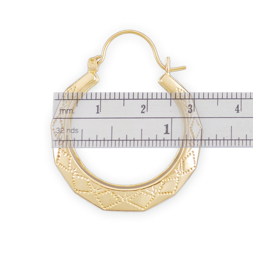 Close-up detail of 10K yellow gold hollow door knocker earring showing drop-down clip closure