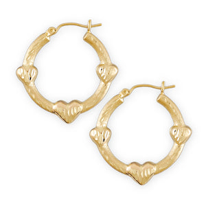 A pair of 10k gold hollow diamond cuts three hearts door knocker earrings with secure clip enclosures.