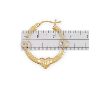10K gold three hearts doorknocker earrings showing 1.1 inch length measurement
