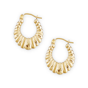 A pair of 10kt gold diamond cut shrimp puffy hollow earrings with clip enclosures.