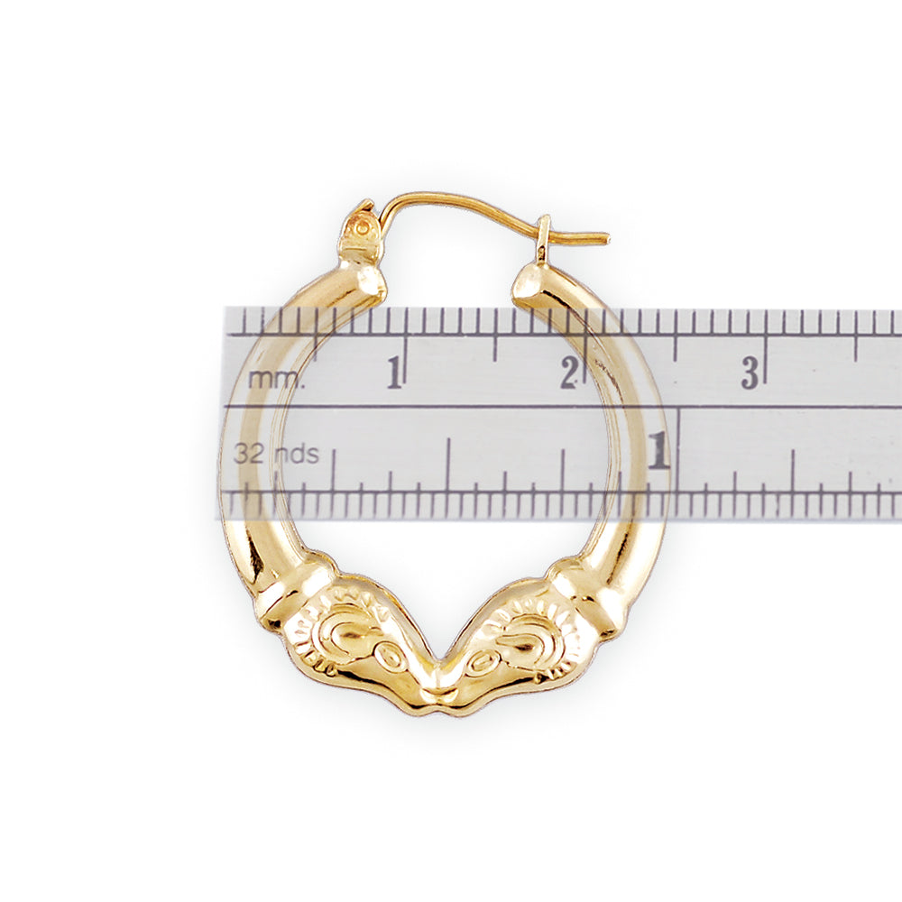 Detail view of 10k real yellow gold ram head door knocker earring showing high polish finish