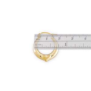 Close-up view of 10k yellow gold heart door knocker hoop earring showing hinged snap closure