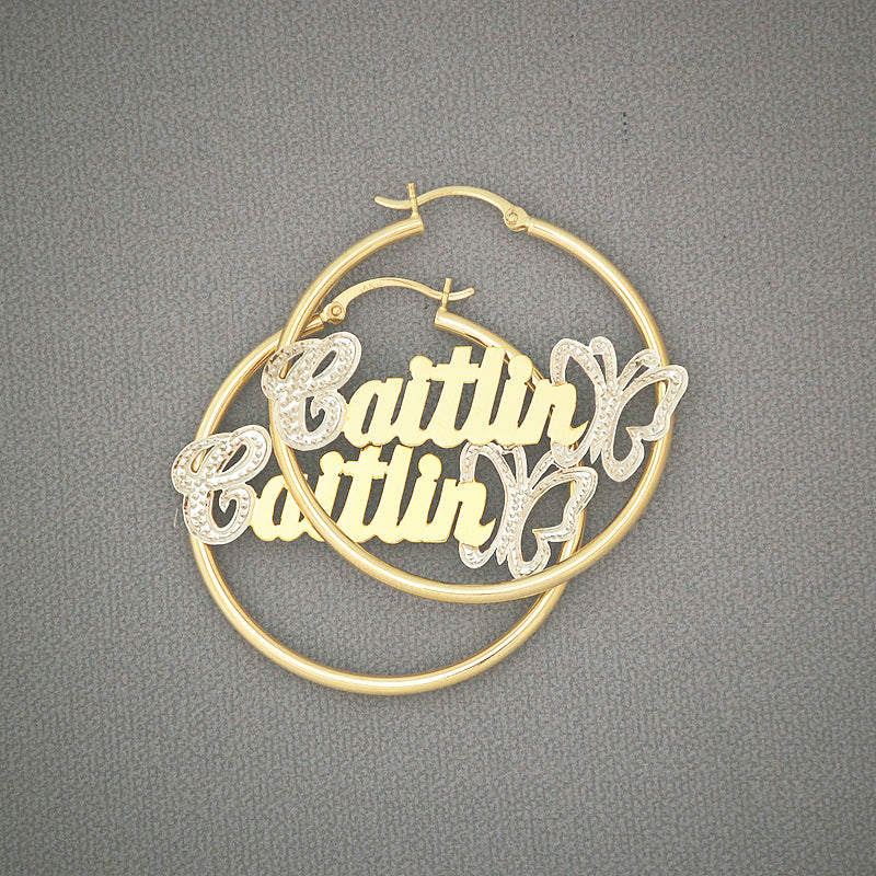 Pair of personalized 14k yellow gold 1.5 inch hoop name earrings with iced butterfly accent