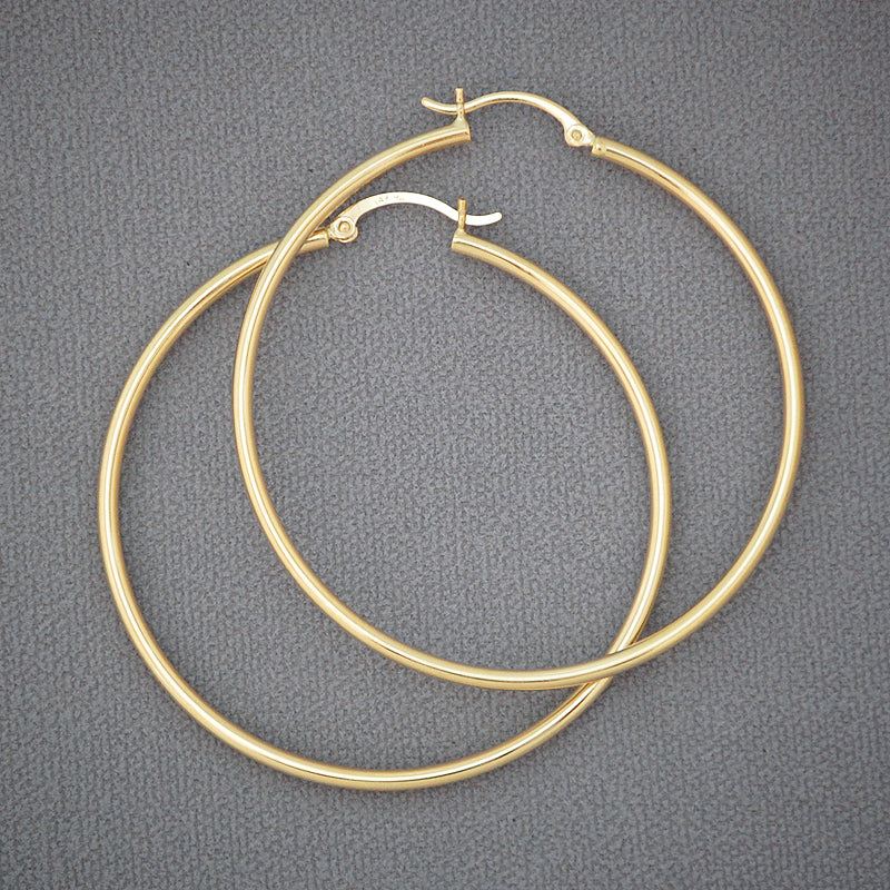 Pair of 14K yellow gold hollow tube hoop earrings 2 inch diameter