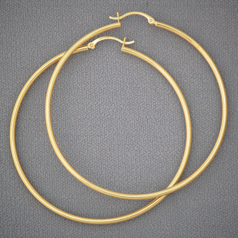 14k yellow gold 60mm hollow hoop earrings with high polish finish