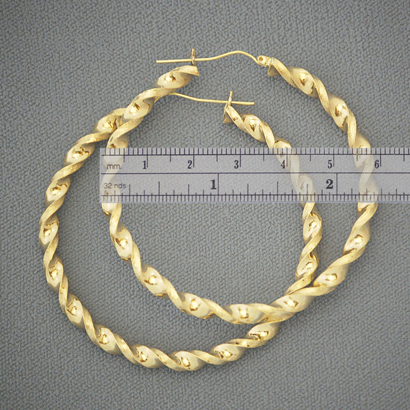 10k gold twisted hoop earrings measured at 2 3/8 inch 60mm diameter