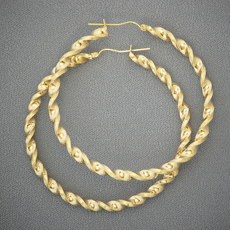 10K yellow gold 4mm twisted round hoop earrings with secure hinged snap closure on white background