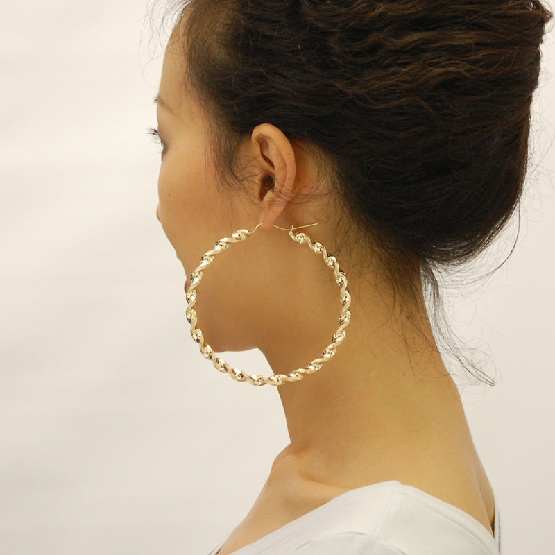 Side view of 10K yellow gold 6mm twisted rope hoop earrings with secure latch closure