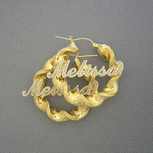 Custom 10K gold iced out name hoop earrings featuring two-tone diamond accent finish and 8mm twisted design