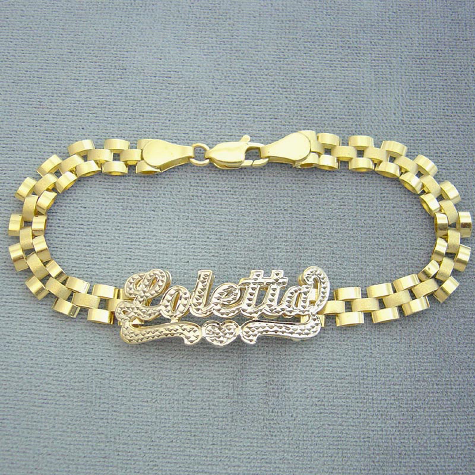 Detail of hand-engraved 3D iced out nameplate on 10K gold presidential link band