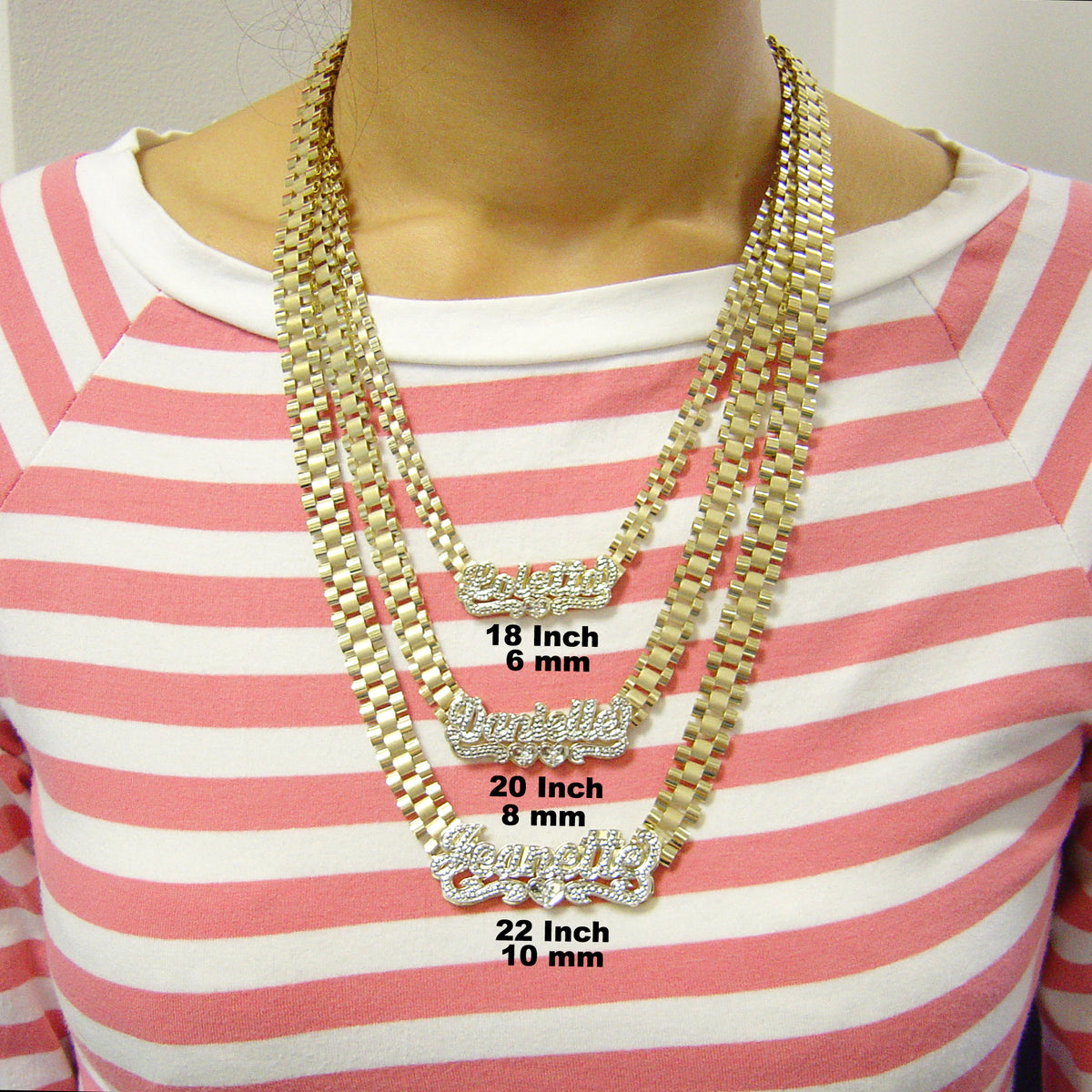Layered 10K gold custom nameplate necklace and watch-band link chain worn on model