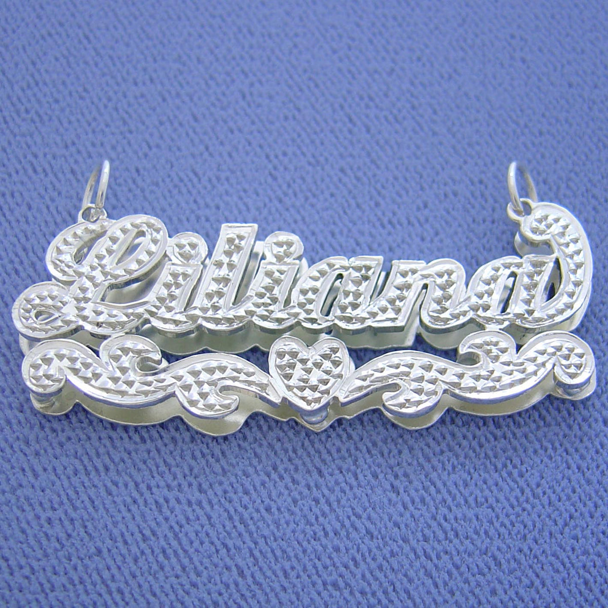 Custom 3D sterling silver name pendant spelling "Liliana" featuring diamond accents and rhodium-plated finish.