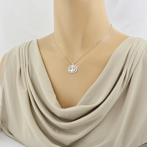 Dainty 3-initial sterling silver monogram necklace worn by model