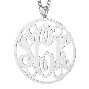 Detailed close-up of a laser-cut 925 sterling silver 3-initial circle monogram pendant showing polished finish and intricate cursive script.