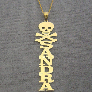 Solid 10k yellow gold vertical nameplate necklace featuring custom name Kassandra topped with an edgy laser-cut skull emblem