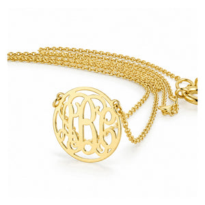Extra small 1/2-inch solid gold 3-initial circle monogram necklace on a rolo chain