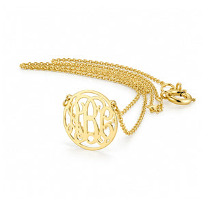 Extra small 1/2-inch solid gold circle monogram necklace with a personalized three-initial pendant and matching chain.