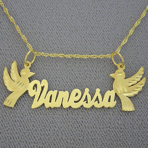 Close-up detail of diamond-cut dove design on solid gold custom name pendant.