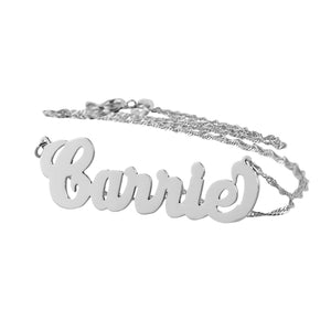 Handcrafted small white gold cursive Carrie name pendant made in Los Angeles