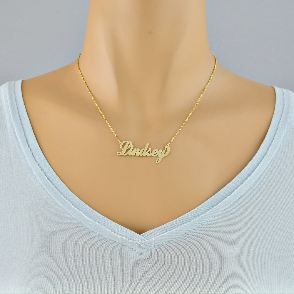 Model wearing a 16-inch personalized 10k gold script font name necklace