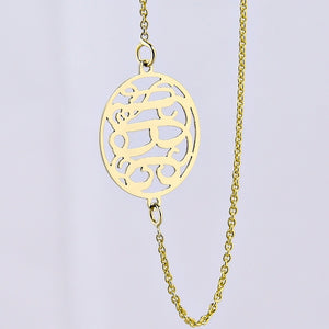 Personalized solid gold circle monogram pendant necklace with a delicate gold chain