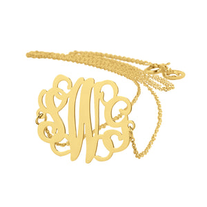 Small 14K yellow gold custom three-initial monogram sideways necklace.