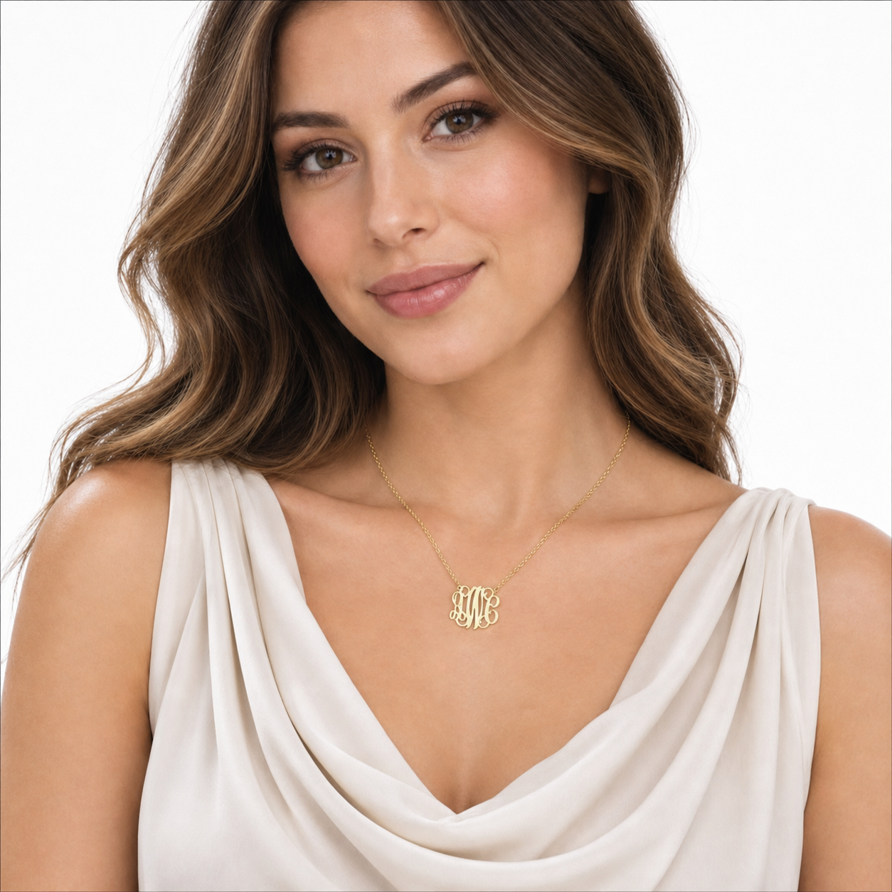 Woman wearing a small solid yellow gold three-initial monogram pendant necklace