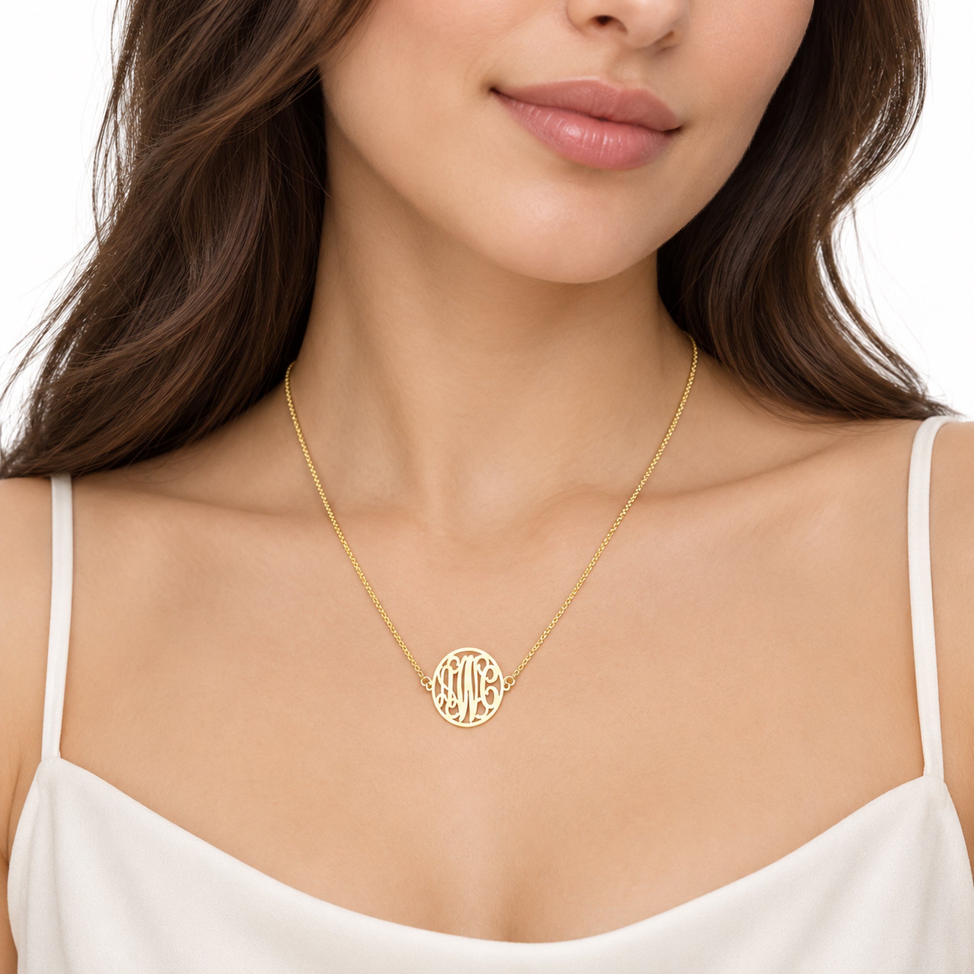 Woman wearing a small solid gold three-initial circle monogram necklace