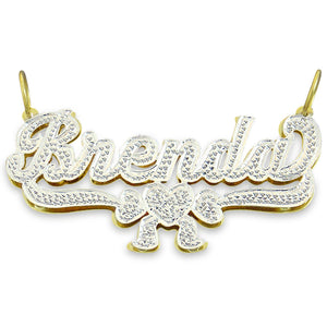Custom 10k or 14k gold double plate name necklace reading Brenda with diamond accent ribbon charm base.