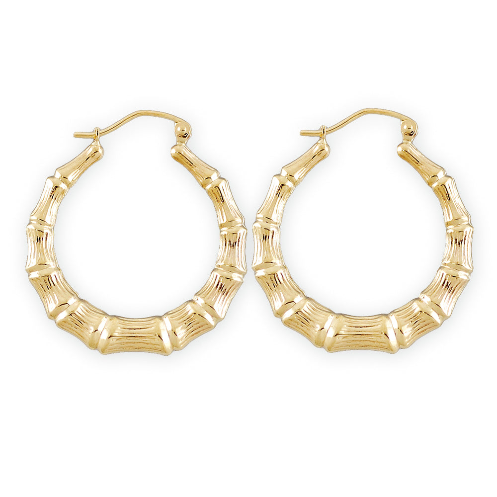 A pair of 1 inch 10kt gold hollow round bamboo earrings