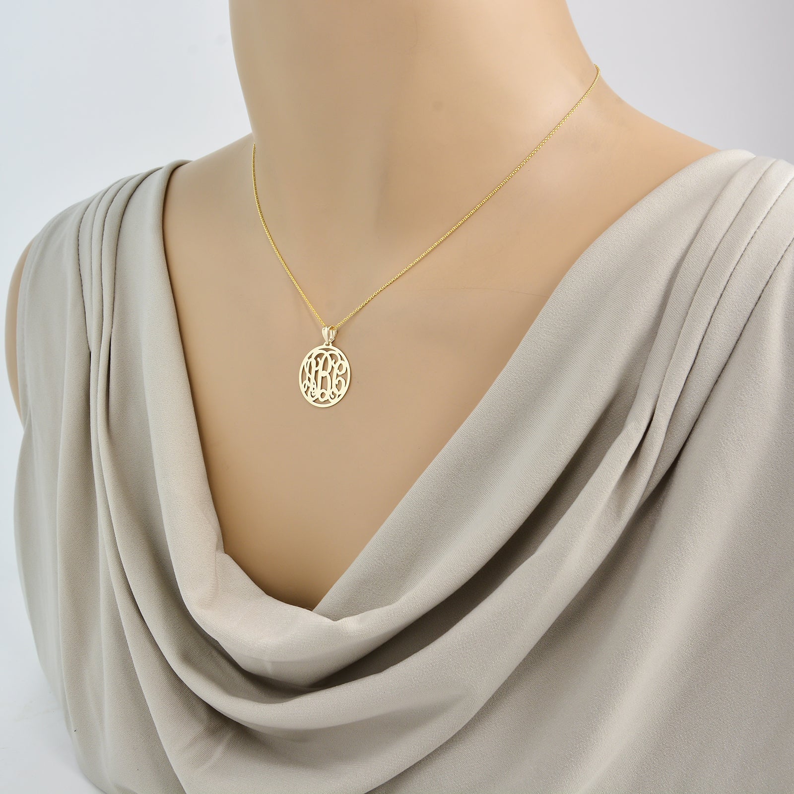 10k gold custom 3 initial monogram pendant with rolo chain necklac on mannequin